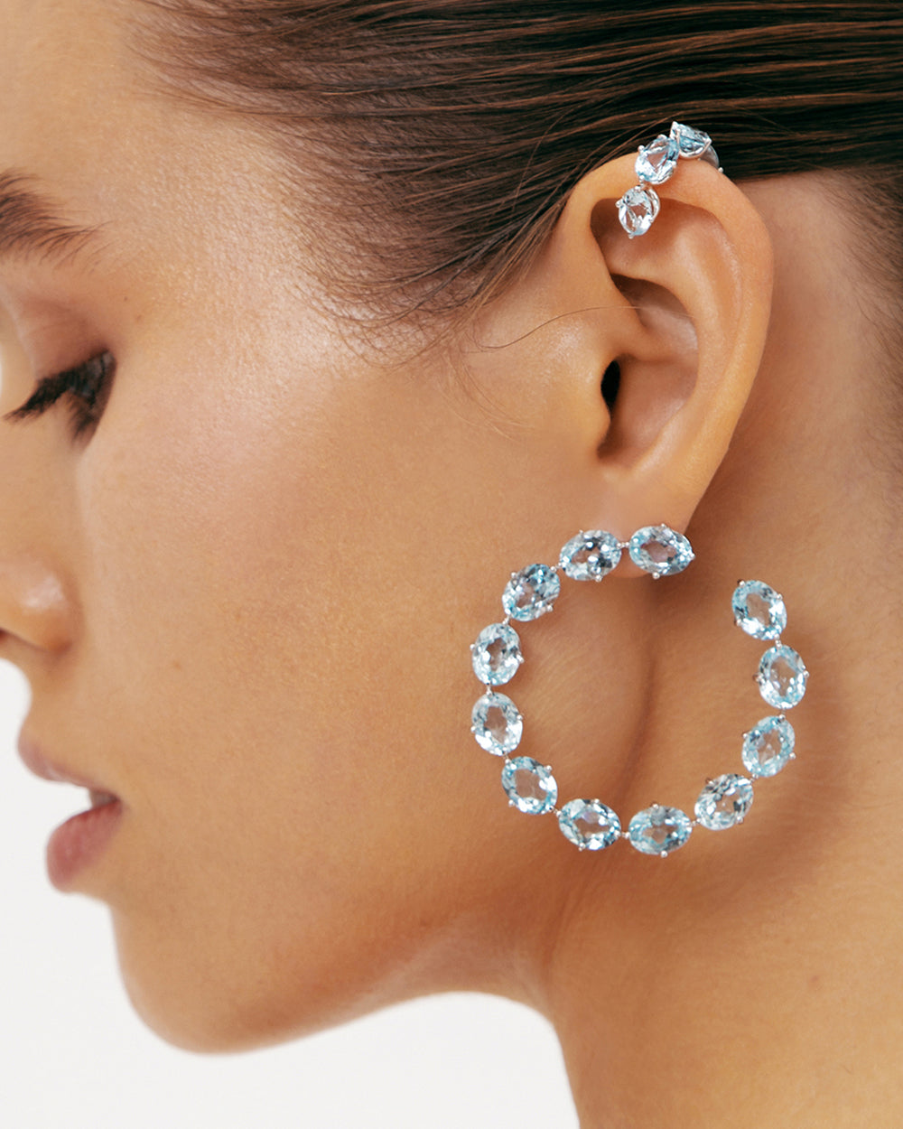 Earrings with sky blue topaz